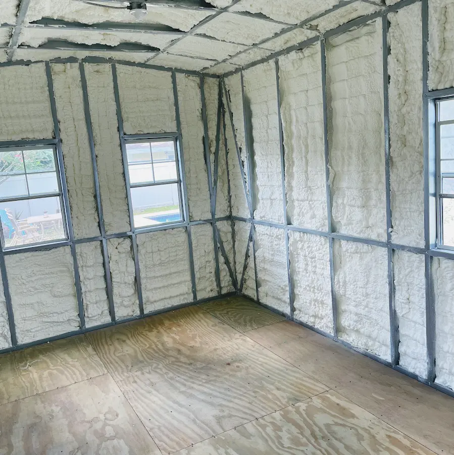 Closed-cell spray foam insulation applied to wall cavities in a residential project in Port Chester